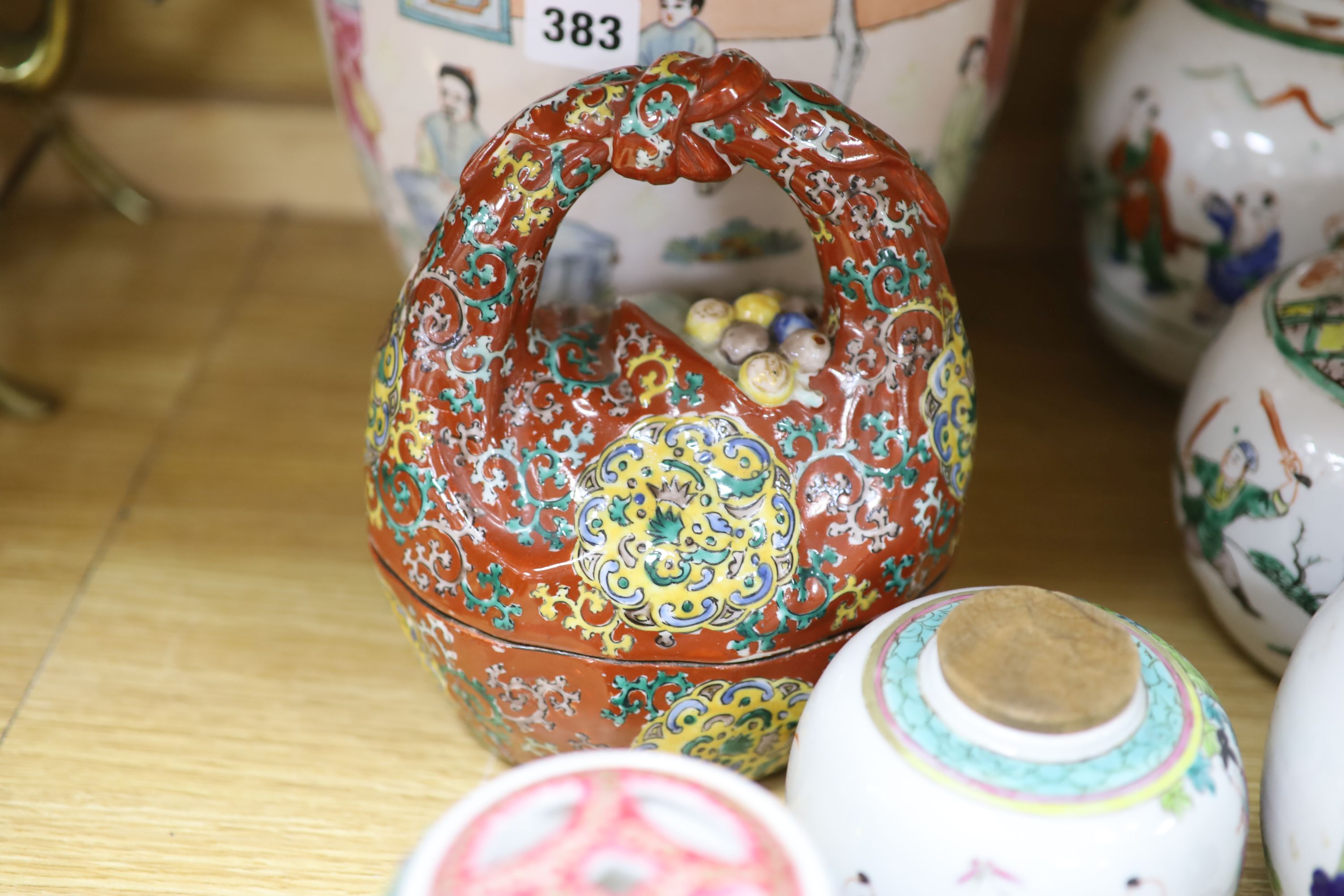 A Chinese vase, six Chinese jars and covers, a box as a basket, a jar and figure, tallest 30cm (11)